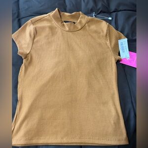 Girls short sleeve shirt size large never worn